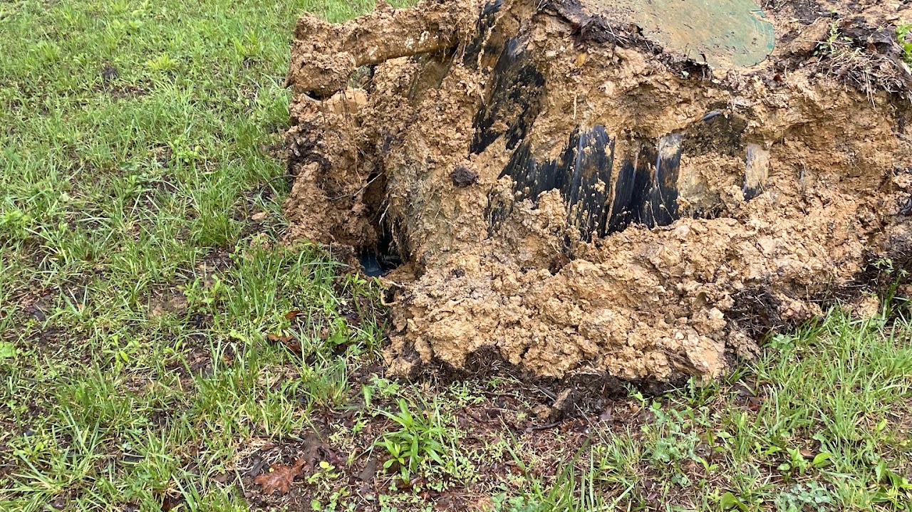 This image is from a customer that had their septic tank float after heavy rains in the area
